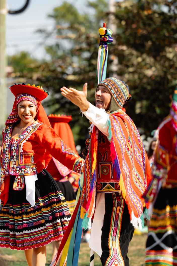 peruvian dancers at a festival showcase their traditional dance for party and festival atendees in their traditional dress in paradise green in stratford CT
